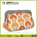 bottom Cosmo Clutch/Convertible wrist or shoulder strap/wipes pocket, two small accessory pockets and a key clip